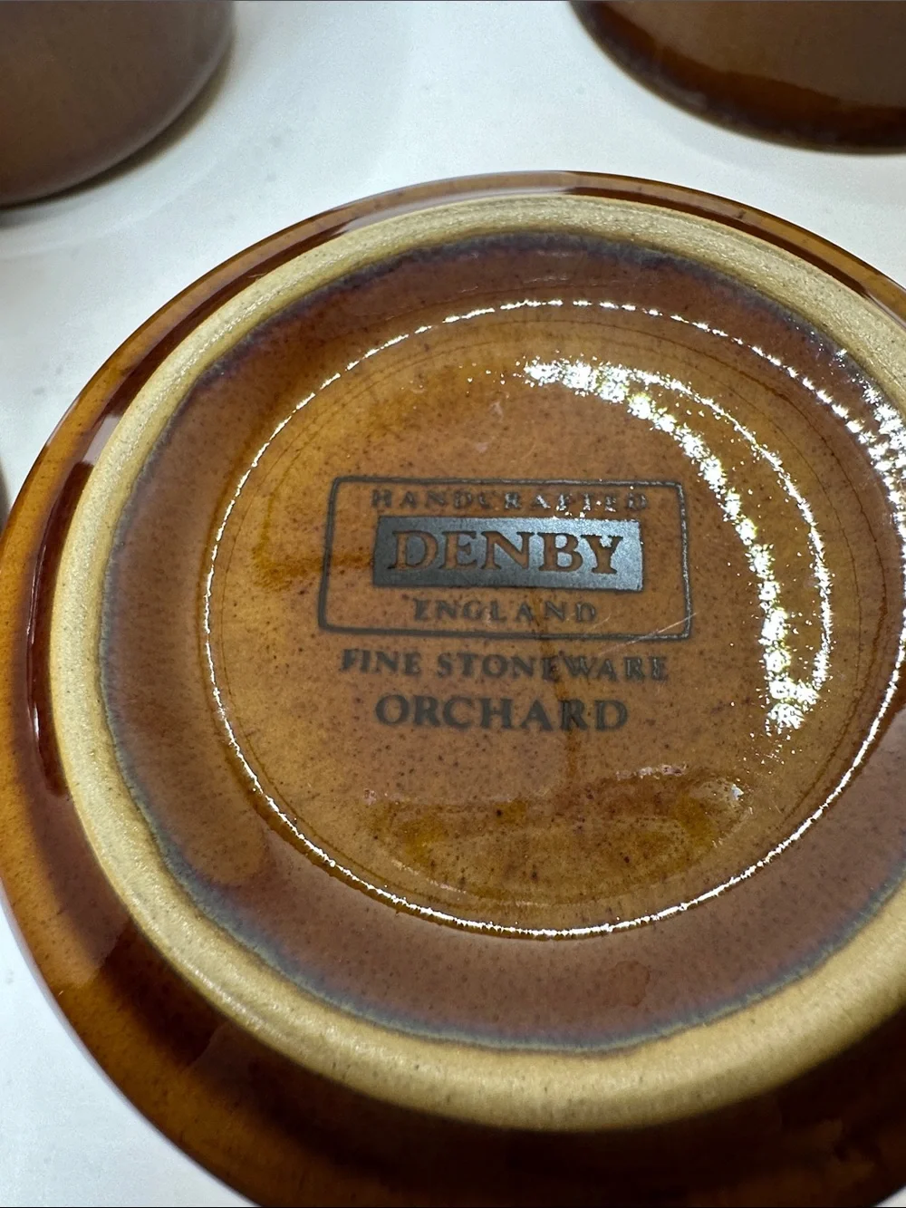 Set of 4 Denby Orchard Stoneware Ramekins feature a glossy brown Glaze.